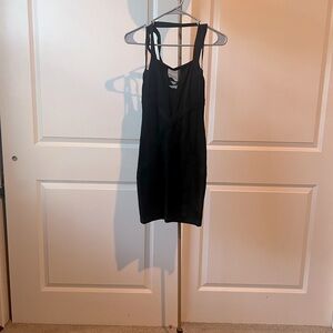 Bebe Classic Black peekaboo mesh mini dress